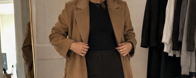 Camel wool blend coat on a rail